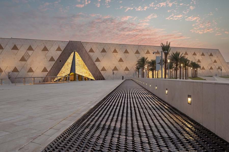 The Grand Egyptian Museum facade at dusk